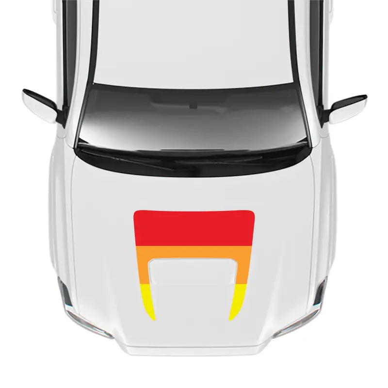 White car with colorful hood decal showcasing the Tacoma Sport/Pro Hood Stamp for pro sport hood