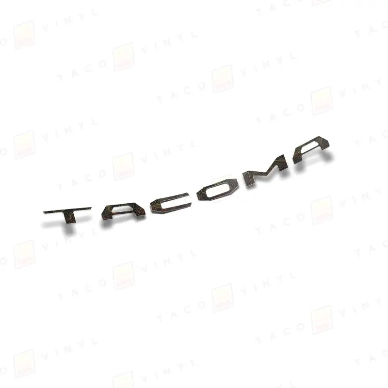 Black TACOMA lettering on 2024+ Tacoma Tailgate with air release vinyl for easy installation