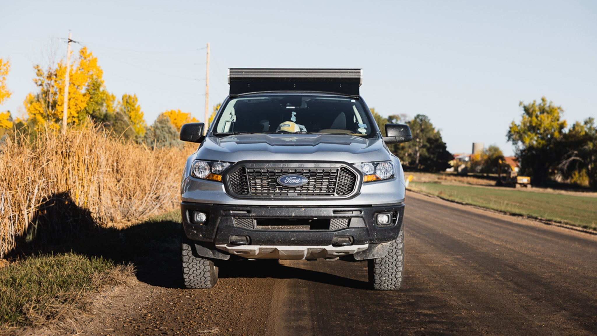 Front view of a Ford Ranger equipped with Stratus roof rack and GFC camper, designed for enhanced storage and off-road utility.