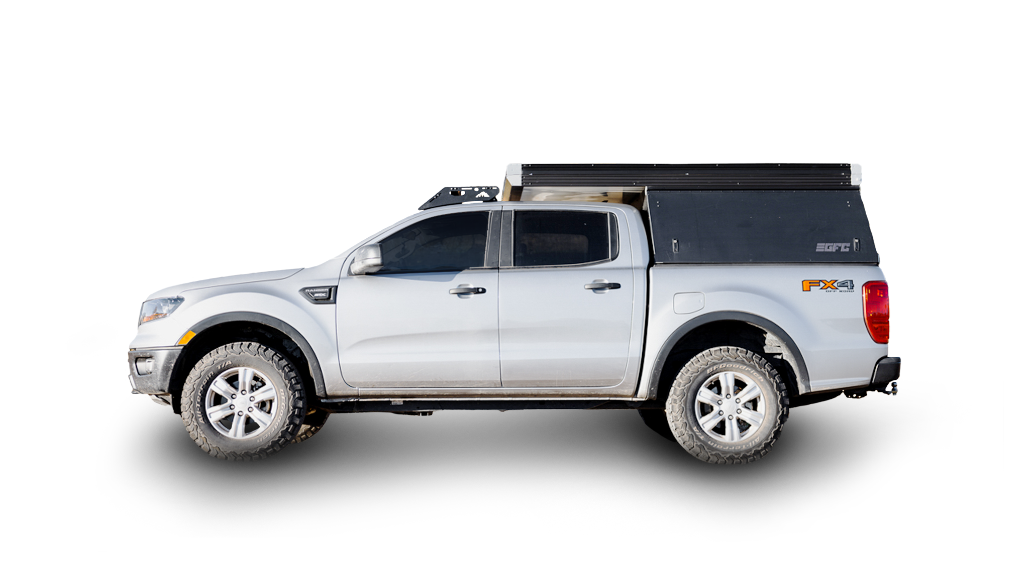 Silver Ford Ranger with Stratus roof rack and GFC camper, showcasing extra storage capacity and rugged design for outdoor adventures.