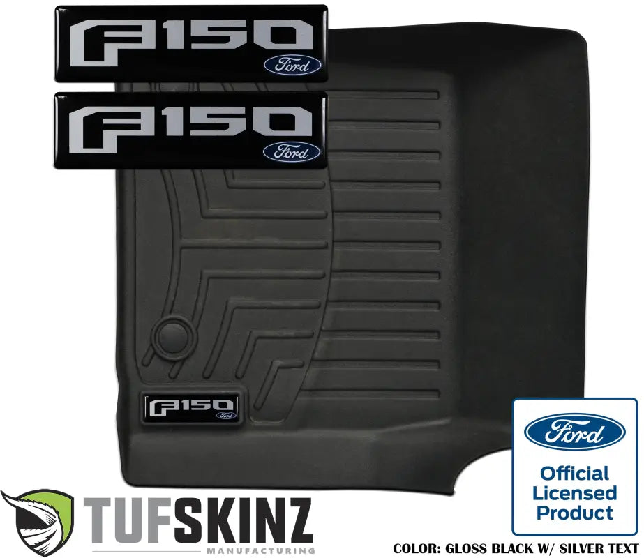 Gloss black badge inserts with silver 'F150' text for WeatherTech floor mats, showcasing Ford official licensed product branding.