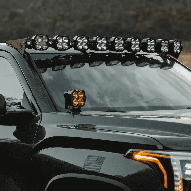Side view of Toyota Tundra 2022+ with Baja Designs 9XL Roof Bar, featuring sleek design and powerful off-road lighting setup.