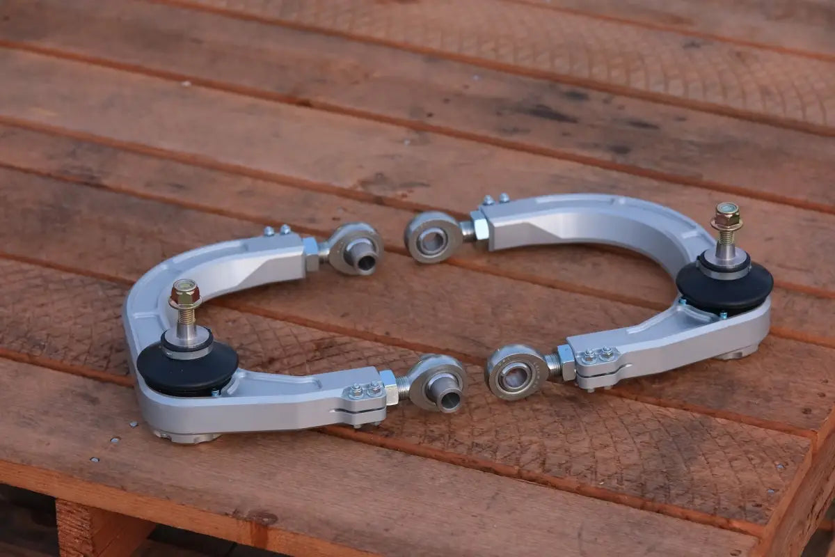 Silver adjustable upper control arms for 2024+ Tacoma, GX550, Landcruiser, kevlar reinforced, sealed, precision machined