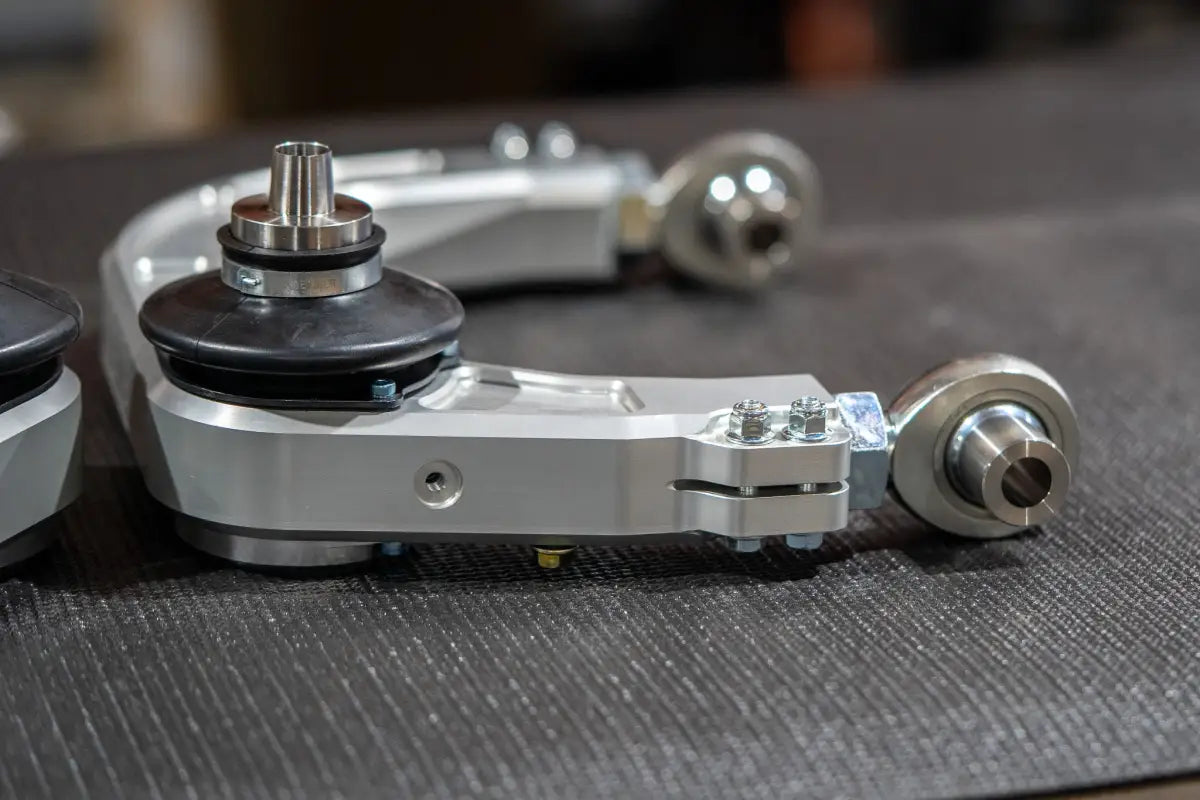 Silver car suspension components Billet Uniball UCA for 2024+ Tacoma GX550 Landcruiser kevlar reinforced completely sealed precision machined