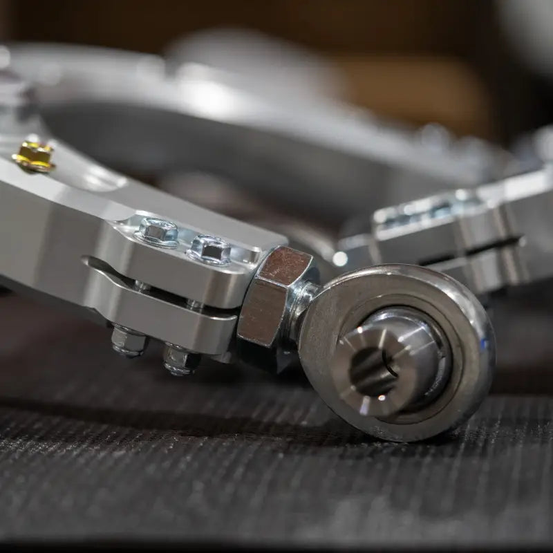 Silver adjustable suspension arm Kevlar reinforced and precision machined for Tacoma Landcruiser
