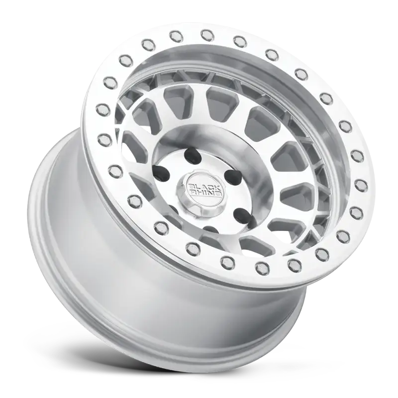 Angled view of Black Rhino PRIMM silver wheel with silver rivets, highlighting its durable and stylish design for trucks and SUVs.