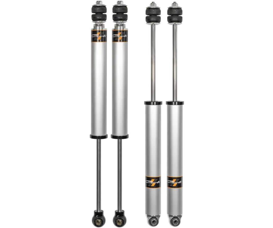 Set of four Carli Suspension Commuter 2.0 shocks for 2014+ Dodge Ram 2500 Diesel, designed for improved ride quality and durability.