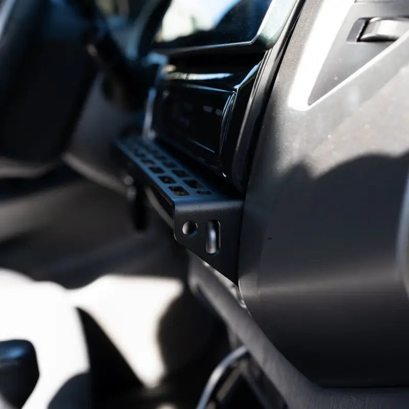 Side view of the Tacoma modular accessory mount, emphasizing its durable powder-coated aluminum construction.