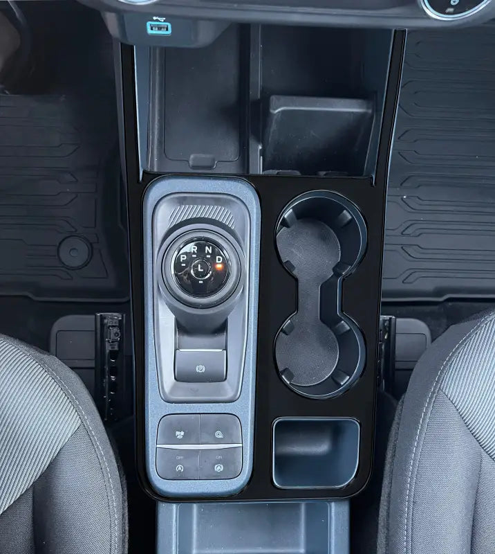 Center console surround with accent overlay for Ford Maverick 2022-2024 interior