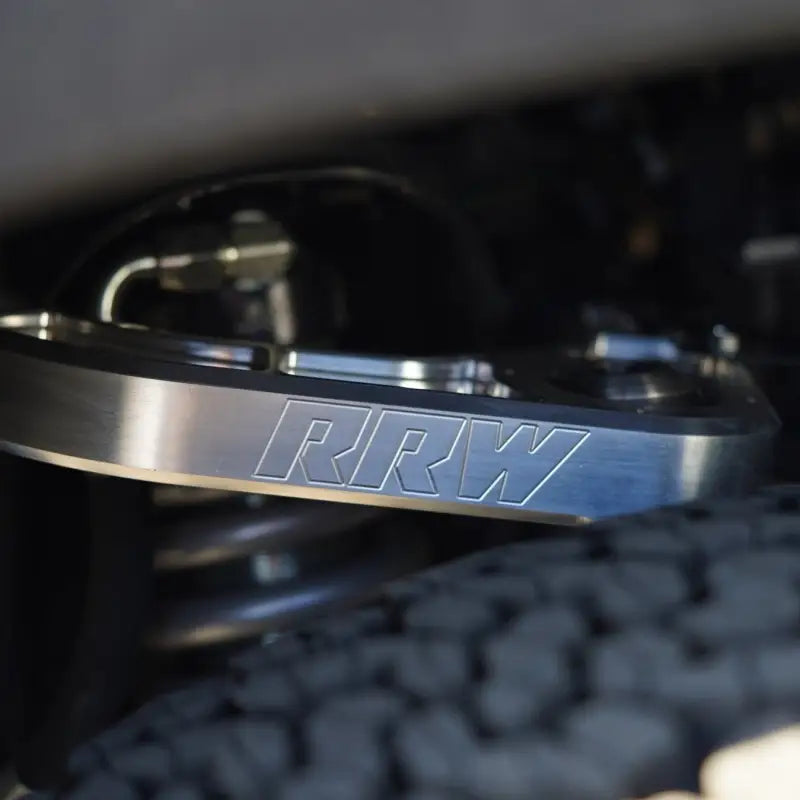 CNC Billet Upper Control Arm with RRW logo installed on a 2022+ Toyota Tundra, showcasing durable construction and precision engineering.
