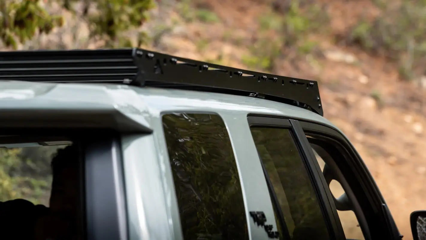 Detailed view of Crestone Sport Roof Rack on a 4Runner, highlighting its sturdy construction and seamless fit for adventure gear.