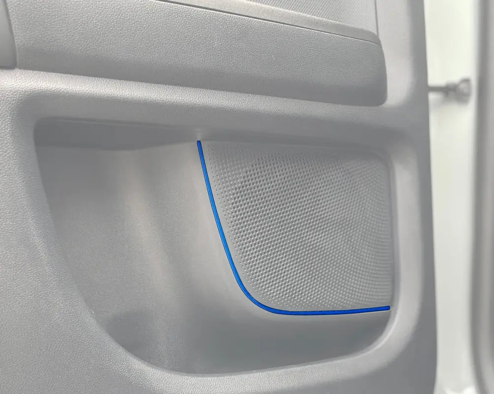 White car door panel with speaker accent overlays for Ford Bronco Sport 2021-2024