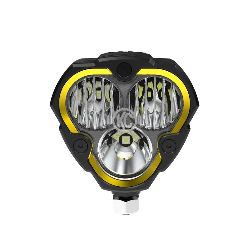 Front view of FLEX ERA® 3 LED light pod with amber accents, featuring a triangular design and KC logo for off-road use.