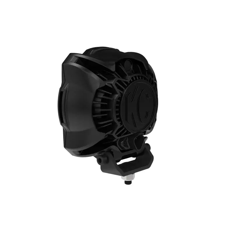 Angled rear view of Gravity Titan 6" LED Light showing the KC logo and durable mounting system.