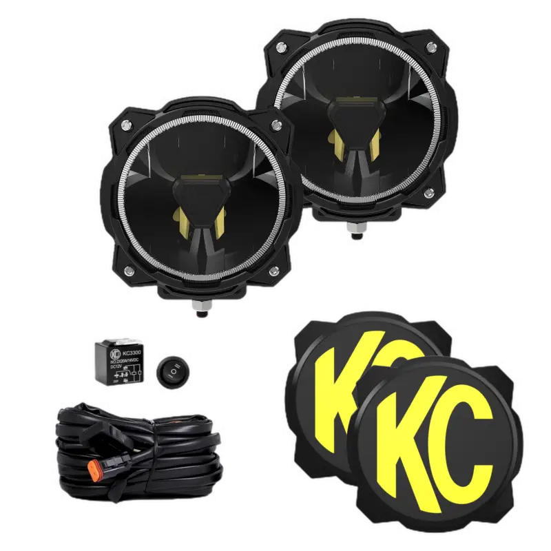 Gravity Titan 6" LED Lights pair pack with spot beam, wiring harness, and KC logo covers for off-road vehicles.