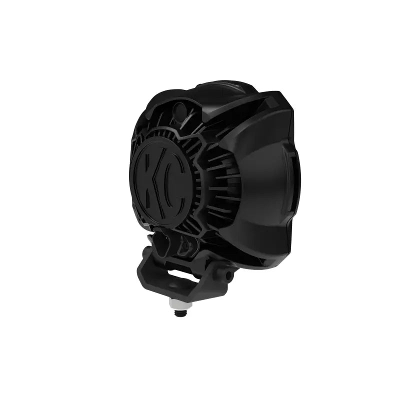 Rear angled view of Gravity® Titan™ 6" LED light with KC logo and mounting bracket for secure installation on vehicles.