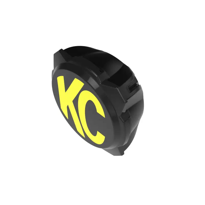KC logo cover for Gravity® Titan™ 6-inch LED off-road light, featuring bold yellow branding on a black background.