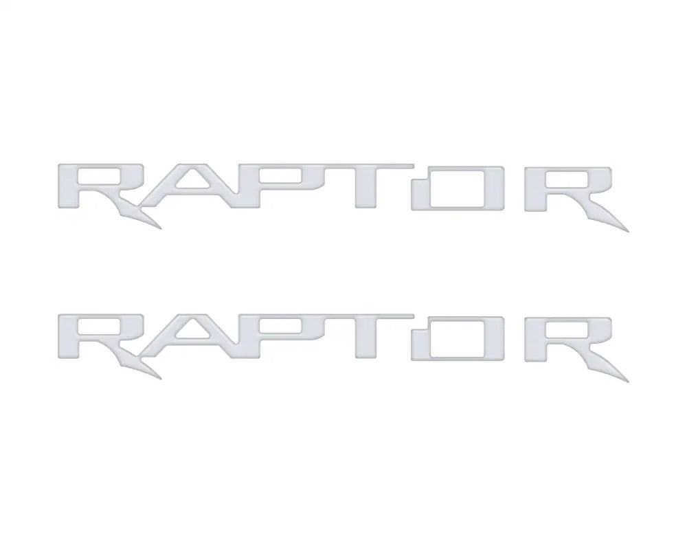 Two silver RAPTOR hood cowl emblem inserts for Ford F-150 and Bronco Raptor