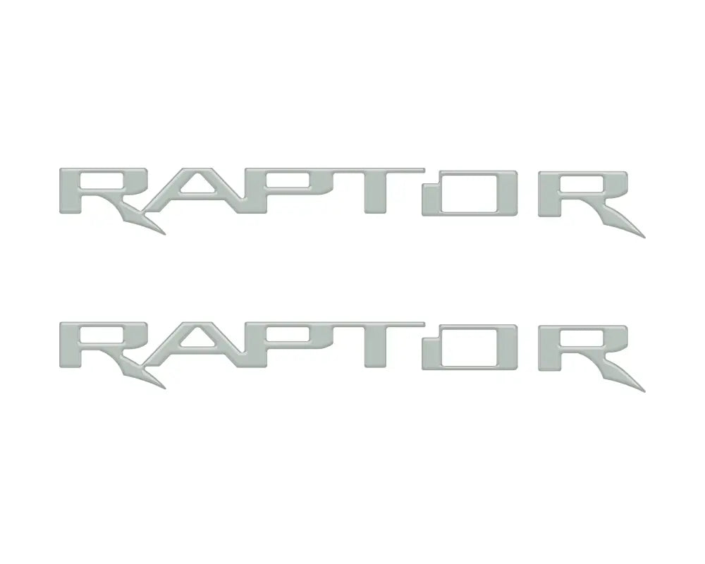 Two silver RAPTOR hood cowl emblem inserts for Ford F-150 and Bronco Raptor