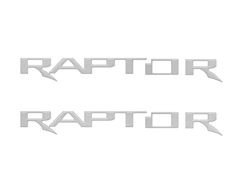 Two silver Raptor hood cowl emblem inserts for Ford F-150 and Bronco Raptor