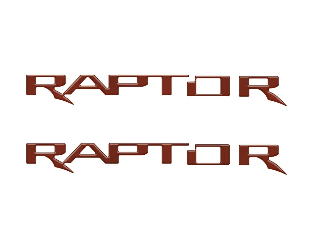 Two brown Raptor hood cowl emblem inserts for Ford F-150 and Bronco Raptor
