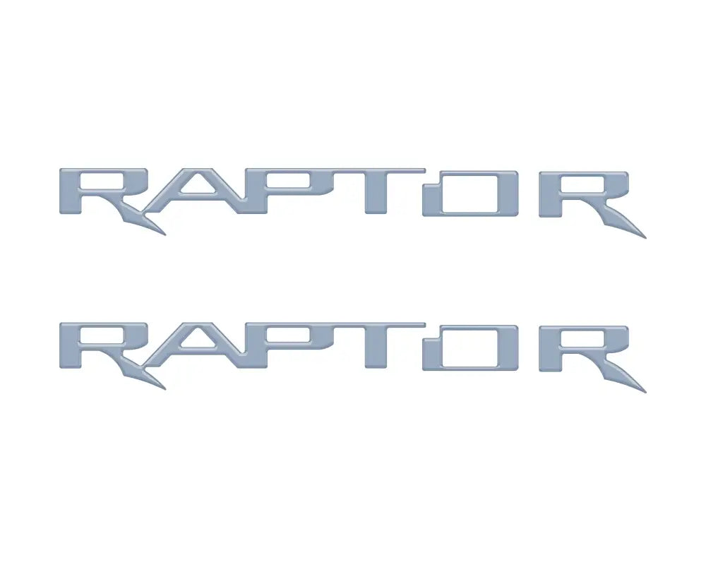 Two silver RAPTOR hood cowl emblem inserts for Ford F-150 and Bronco Raptor