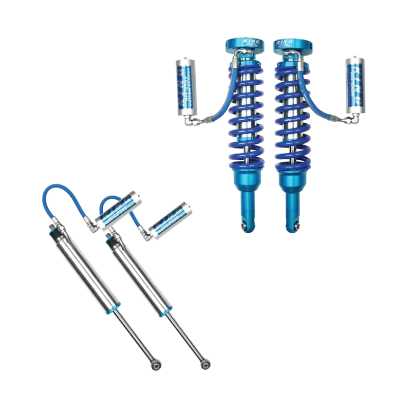King 2.5 mid travel suspension kit for Toyota Tacoma (05-23), including front coilovers and rear shocks with external reservoirs for optimal performance.