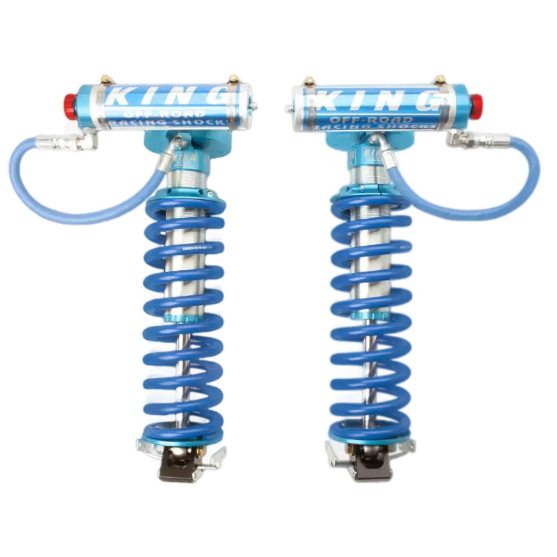 King 2.5 Performance Series front coilovers for 2005-2023 Ford F250/350 with gas-charged reservoirs and adjustable height for off-road use.