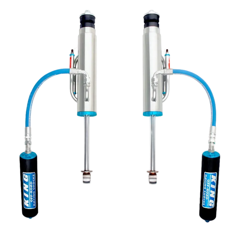 GX470 rear bypass shocks with adjustable compression and rebound, featuring hydraulic bump stops and finned reservoirs for 2003-2009 Lexus models.