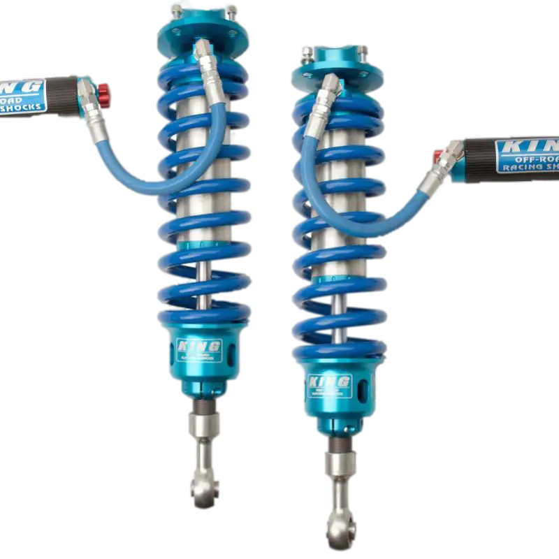 Pair of King 3.0 Stage 3 Coilovers with blue springs and remote reservoirs, engineered for 2007-2021 Toyota Tundra suspension upgrades.