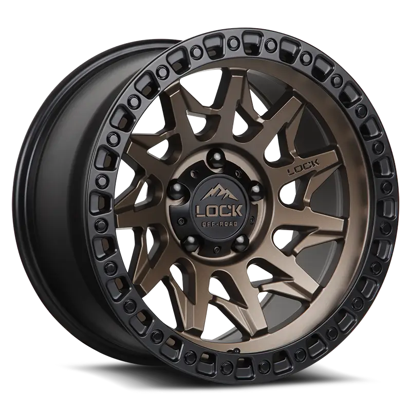 LUNATIC MATTE BRONZE directional wheel with 11-spoke design, simulated bead-lock, and TACT-coated finish. Durable automotive rim for off-road vehicles.