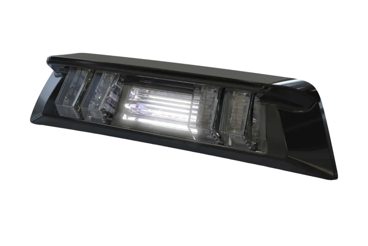 Morimoto X3B LED third brake light for Tacoma (2016-2023) Double Cab, illuminated in bright white with modern black housing.
