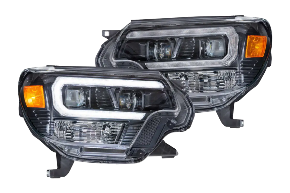 Pair of Morimoto XB LED Hybrid Headlights for Tacoma (2012-2015) featuring modern LED design and OEM fitment.