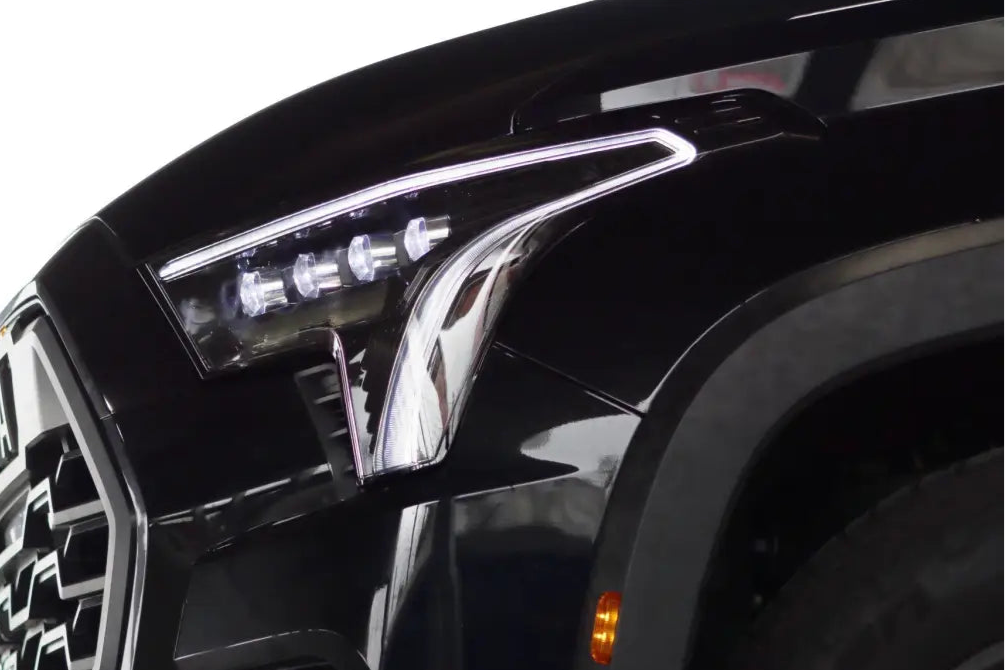 Side view of AlphaRex NOVA-Series LED projector headlights on a Toyota Tundra, showcasing the sleek and modern design.