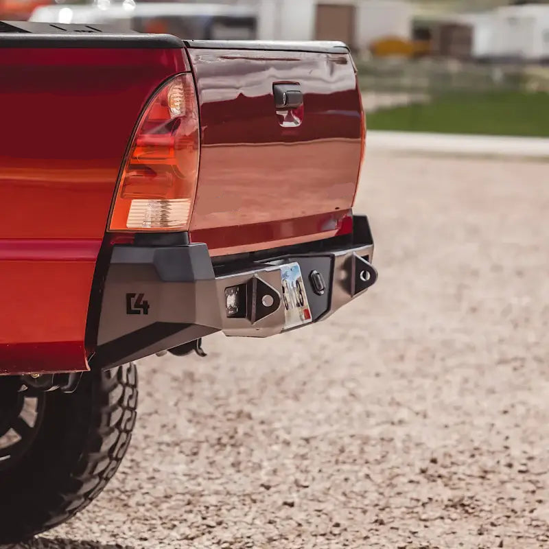 Tacoma Overland rear bumper for 2nd Gen 2005-2015, featuring high clearance design, integrated hitch, and durable steel construction.
