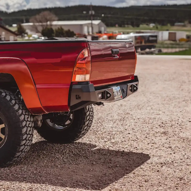 Rear view of Tacoma Overland bumper for 2005-2015 models, showcasing rugged build, easy bolt-on installation, and license plate bracket.