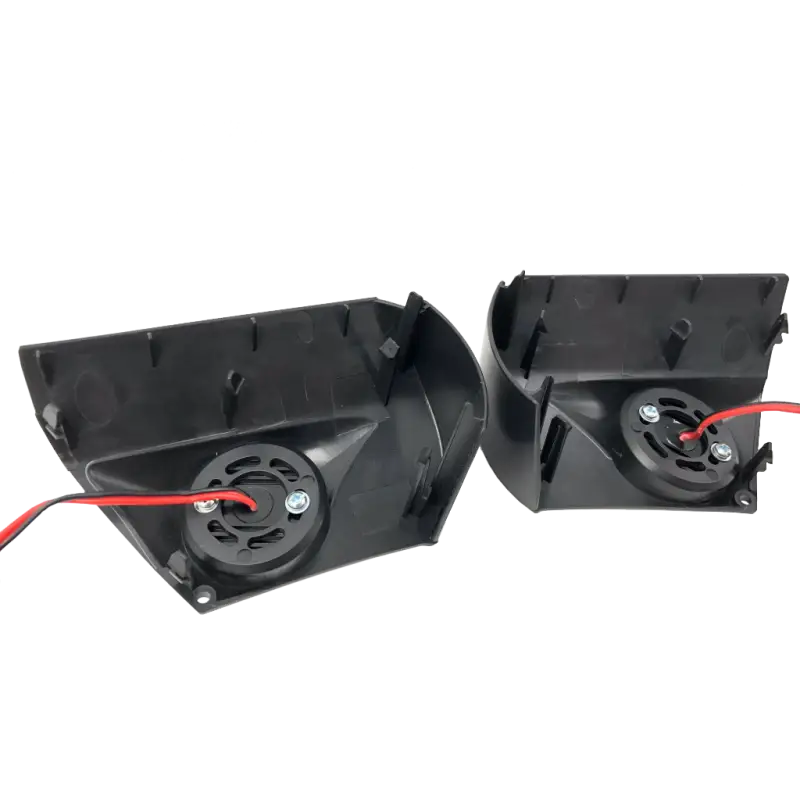 Close-up of Puddle Pods LED light housings with wiring, designed for 3rd Gen Tacoma mirrors.