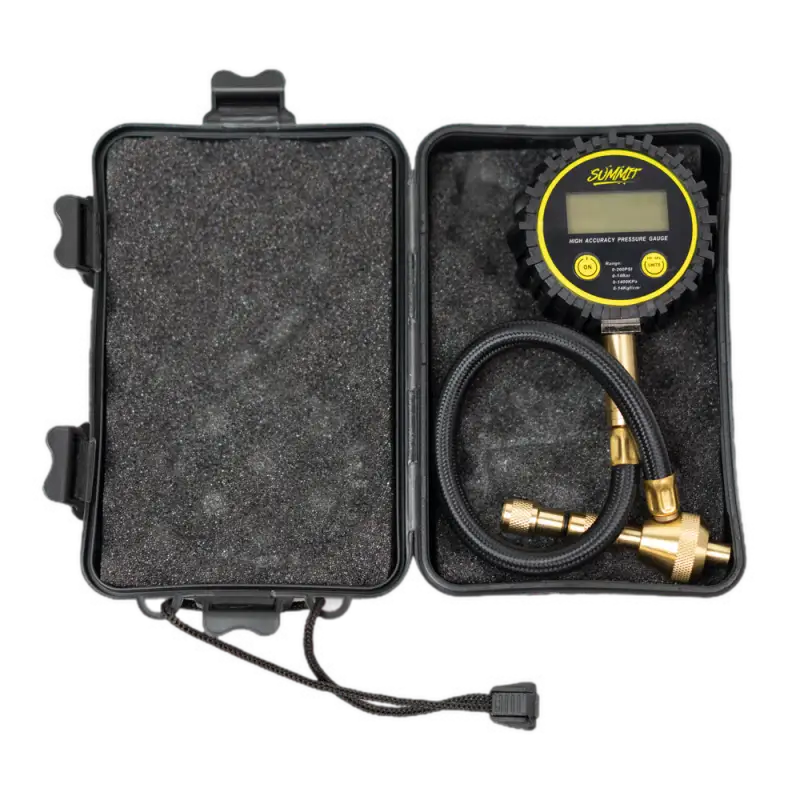 Quick Air Down Tool with digital gauge stored in a protective hard case with foam padding for secure transport and storage.