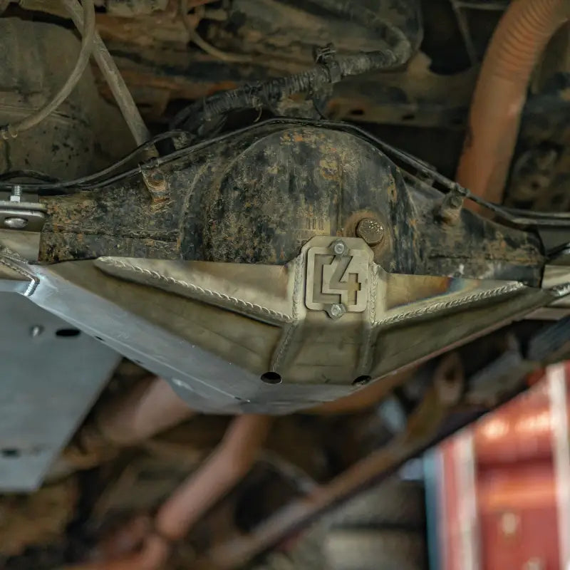 Tacoma rear differential skid plate installed on a 2005-2015 vehicle, showcasing durable 3/16″ steel construction and bolt-on design.