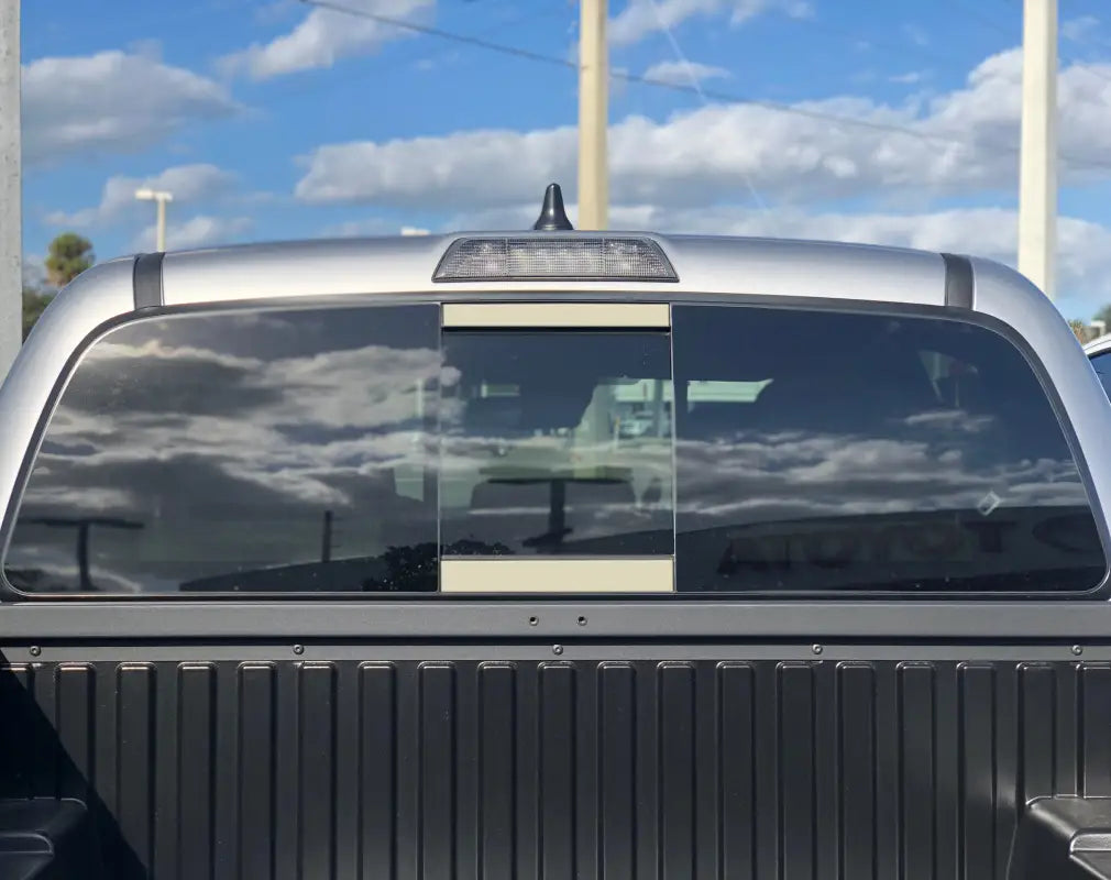 Orange rear power sliding window accent overlays for 2016-2023 Toyota Tacoma, adding a warm and energetic accent.