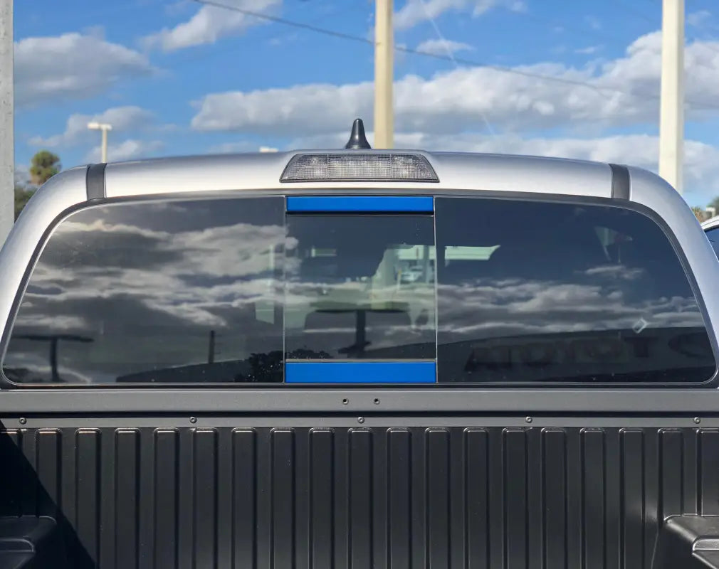 Red rear power sliding window accent overlays for 2016-2023 Toyota Tacoma, delivering a striking and sporty look.