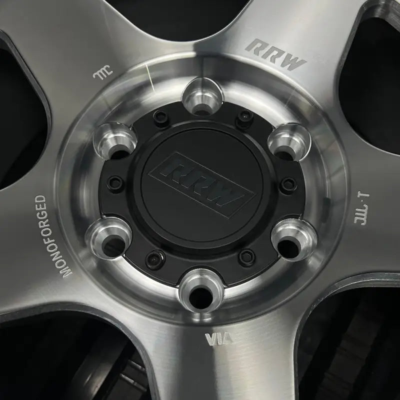 Silver and black car wheel from RG4-H Hybrid MonoForged Series with embossed ABS details