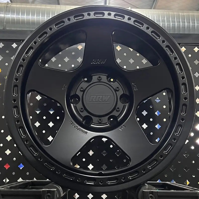 Black alloy wheel from RG4-H Hybrid MonoForged Series with embossed ABS and decorative rim