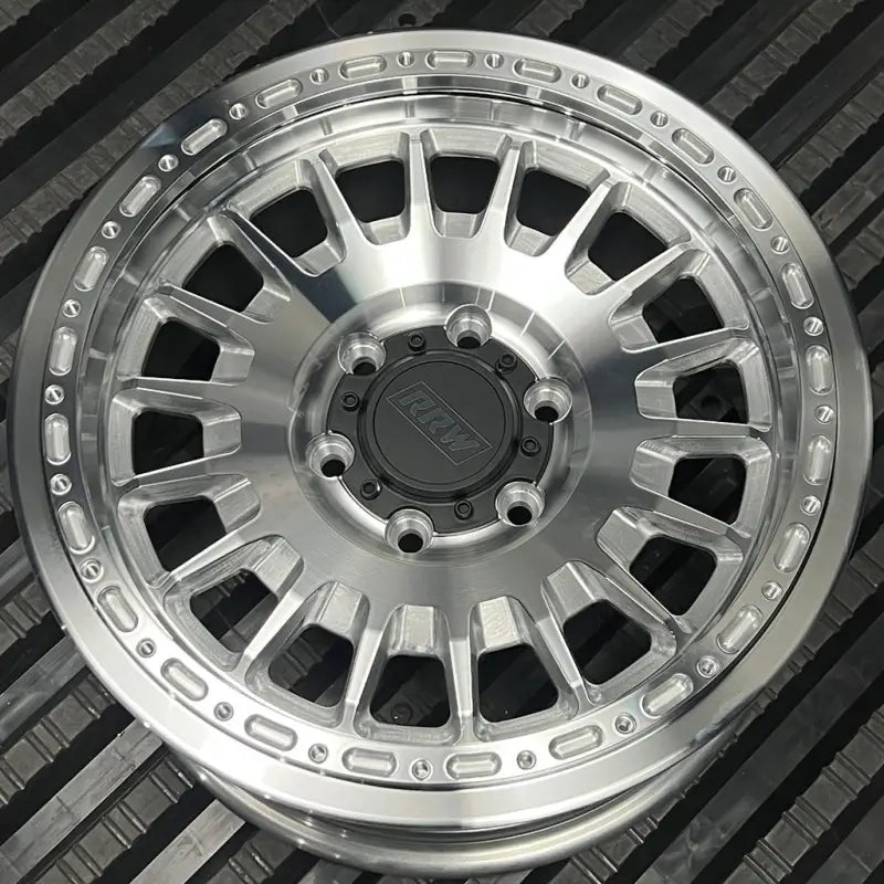 Silver aluminum alloy wheel from the RG7-H Hybrid MonoForged Series with embossed ABS