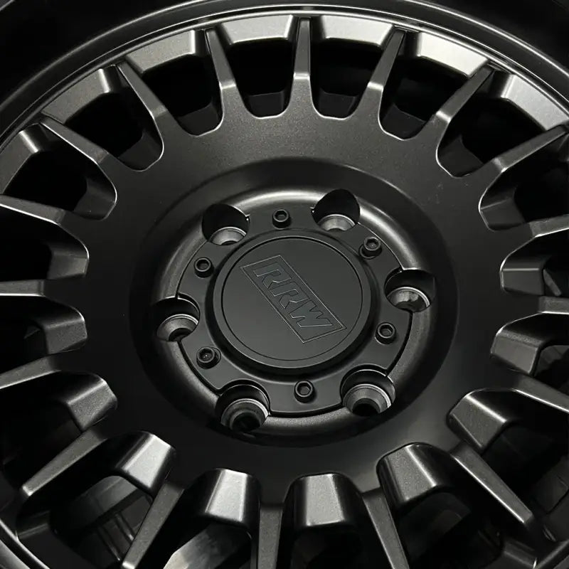 Gray alloy wheel from RG7-H Hybrid MonoForged Series with embossed ABS and lug nuts