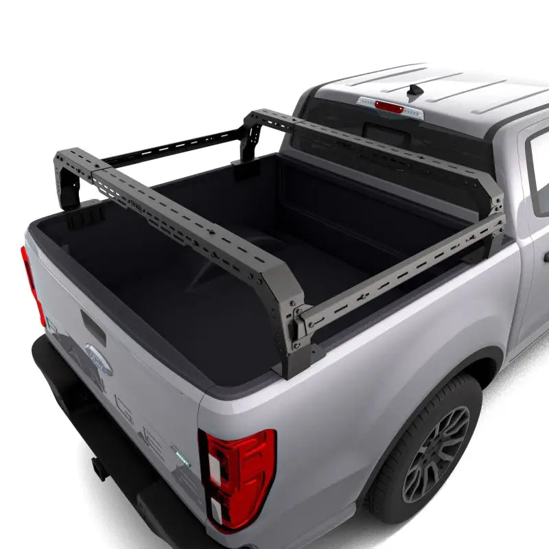 Ford Ranger Shiprock Rack showcasing its mid-height design and compatibility with truck bed accessories, supporting heavy loads.