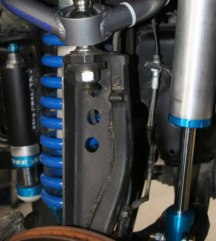 Blue coil-over shock assembly with spindle gussets for 1st Gen Sequoia control arms
