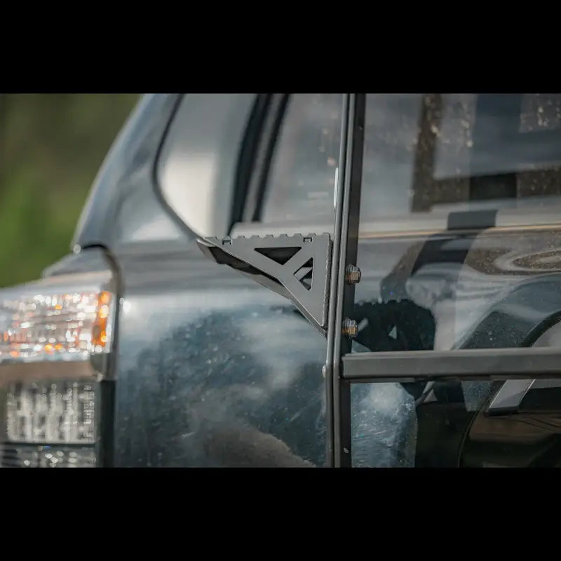 Side view of the 4Runner Summit Hatch Ladder Step installed on a 5th Gen 2010+ 4Runner, showcasing its durable black finish.