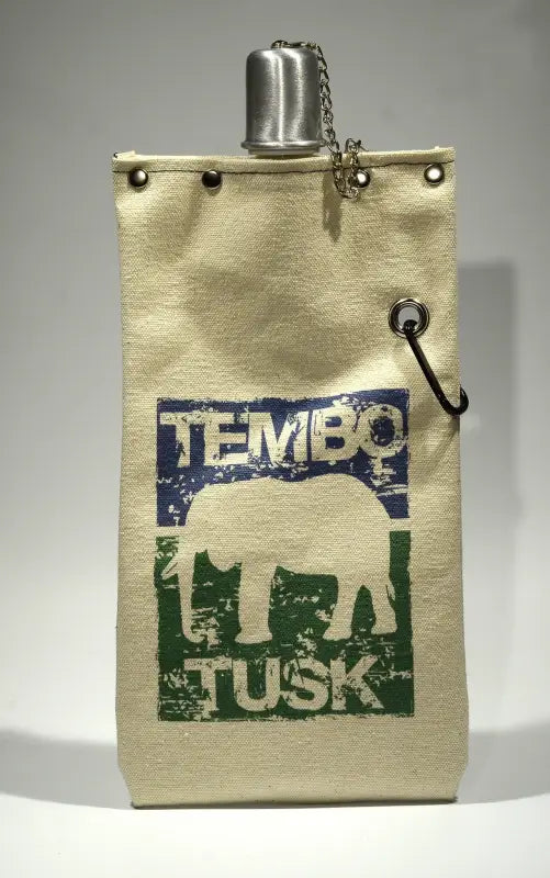 TemboTusk Wine Tote with durable canvas design, featuring an elephant logo, metal shot cup, and carabiner for portability.