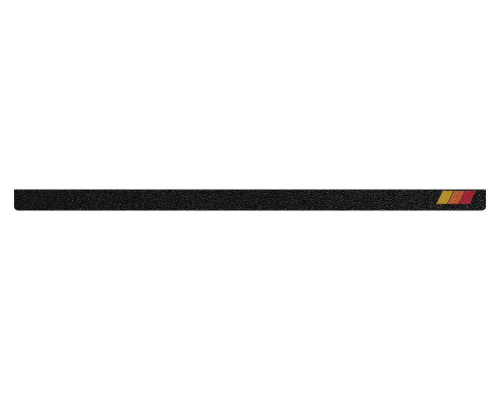 Black textured tailgate protection overlay with tri-color accents for 2005-2015 Toyota Tacoma, offering a sleek and durable design.